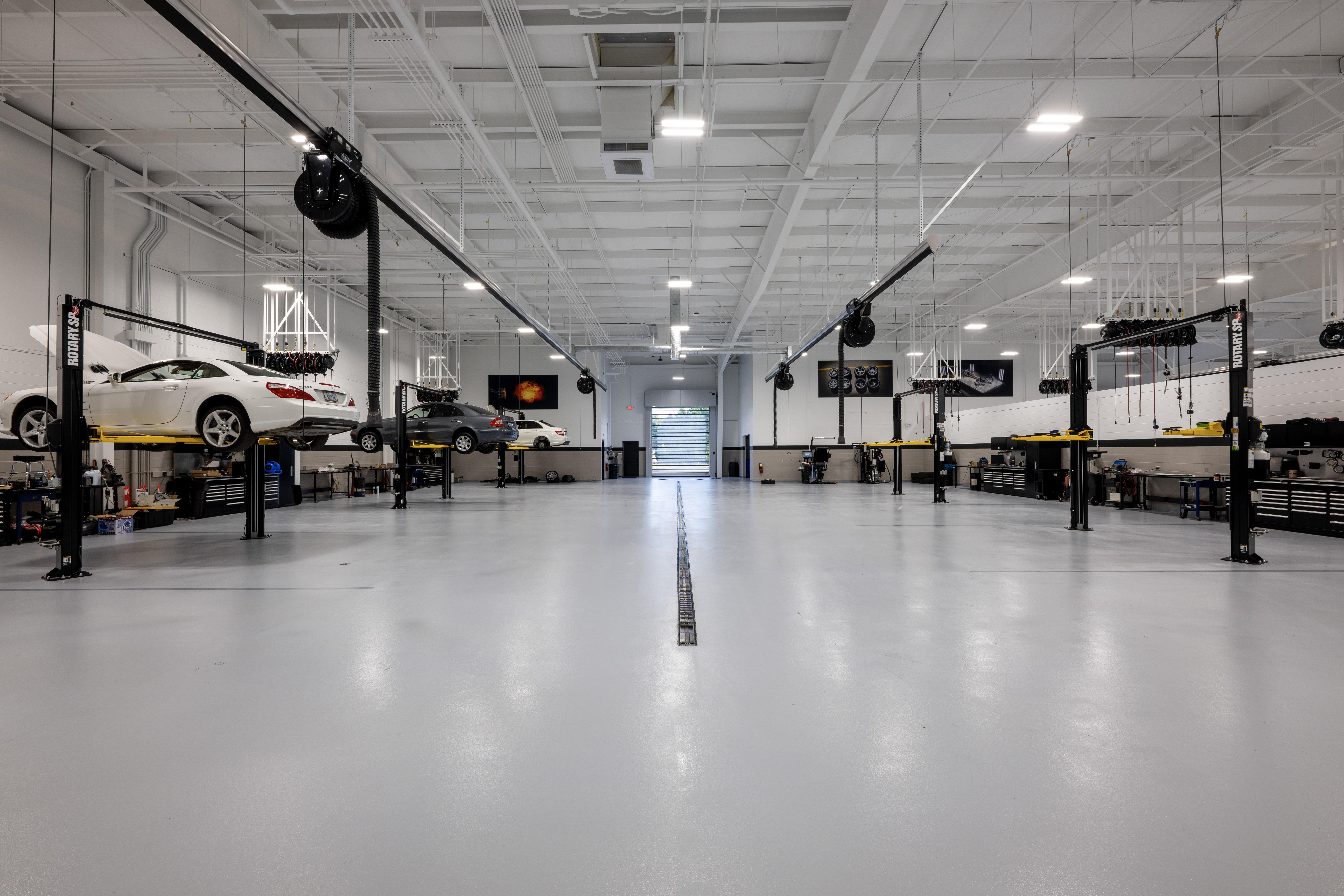 Internal Photo of Cars Getting Worked On